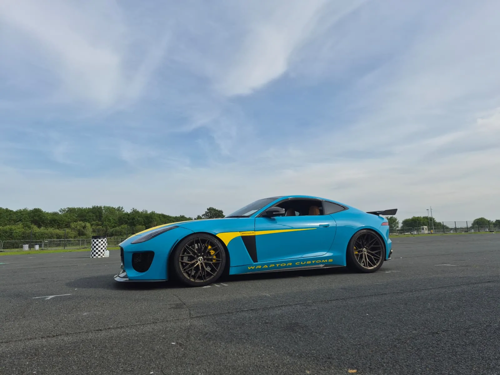 Blue Jaguar F-Type by Wraptor Customs on track